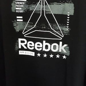 A mock sleeve black, white and gray Reebok tee